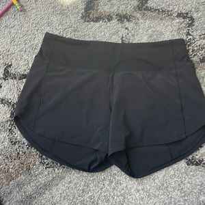 Lululemon athletica speed up mid-rise 4in short. Size 6. Never worn. Black.
